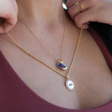 14K Solid Gold Mother of Pearl Evil Eye Pendant with Cubic Zirconia