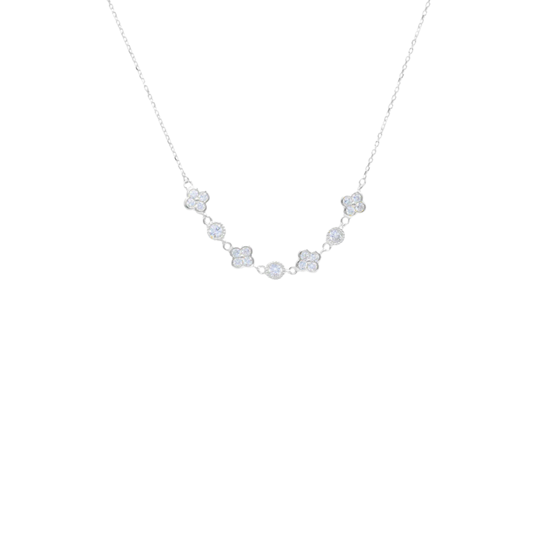 Silver necklace with floral-shaped pendants on a white background