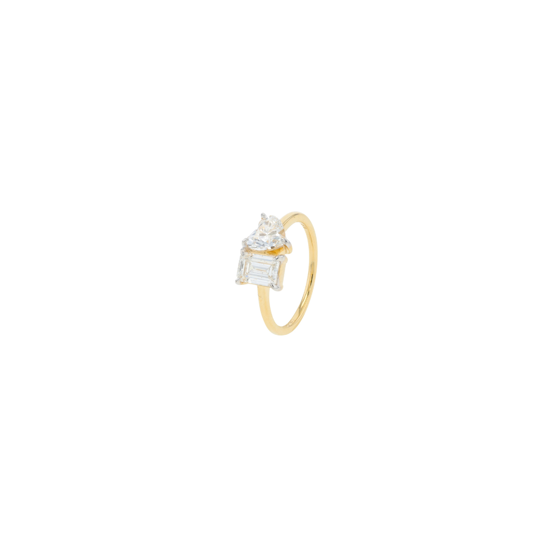 Gold ring with a diamond on a white background