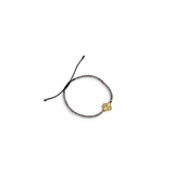 Adjustable black macrame bracelet with smokey quartz beads and 14K gold clover charm on white background