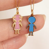 Close-up of custom 14K yellow gold enamel child charm pendants available in personalized colors and engraving options