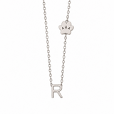 14K solid white gold necklace with an R initial and paw print motif on an 18-inch box chain.