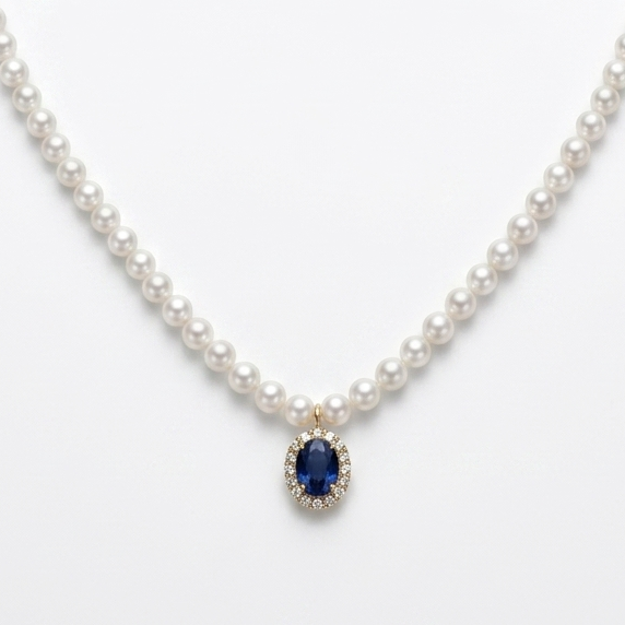 18K solid yellow gold pearl necklace with 118 cultured pearls, an oval blue sapphire centerpiece, and a diamond halo pendant.