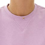 14K solid gold heart necklace with diamond accent layered with fine chain on lavender top