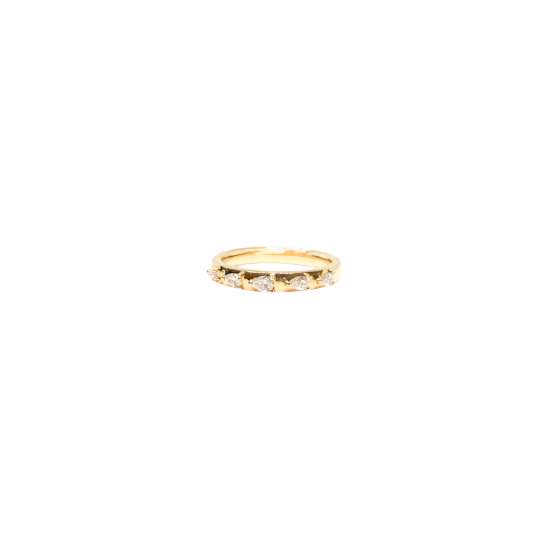 Gold ring with small stones on a white background