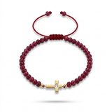 14K solid yellow gold cross bracelet with 4.03 mm Indian red ruby beads and adjustable red satin macramé cord