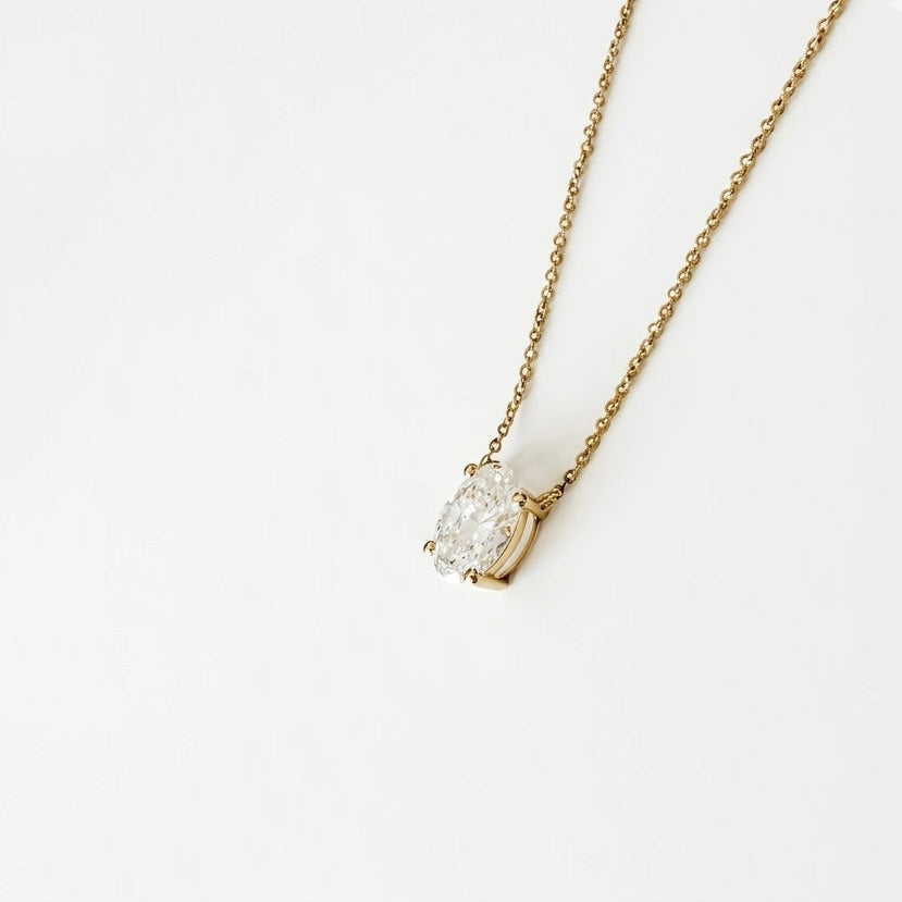 14K yellow gold oval diamond pendant necklace close up lab grown diamond D VS1 fine jewelry detail