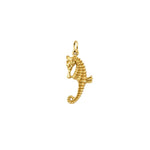 14K solid yellow gold seahorse pendant with detailed textured design and curled tail, approximately 2.20 grams.