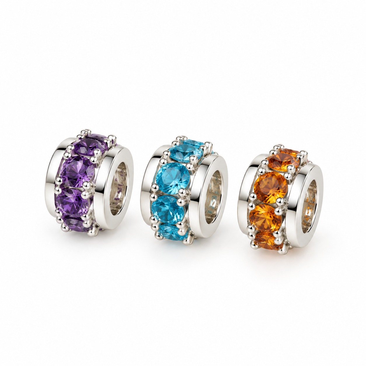 Three 925 sterling silver natural gemstone rondelle spacer charms with amethyst, blue topaz, and citrine gemstones, Laraquel Jewelry.