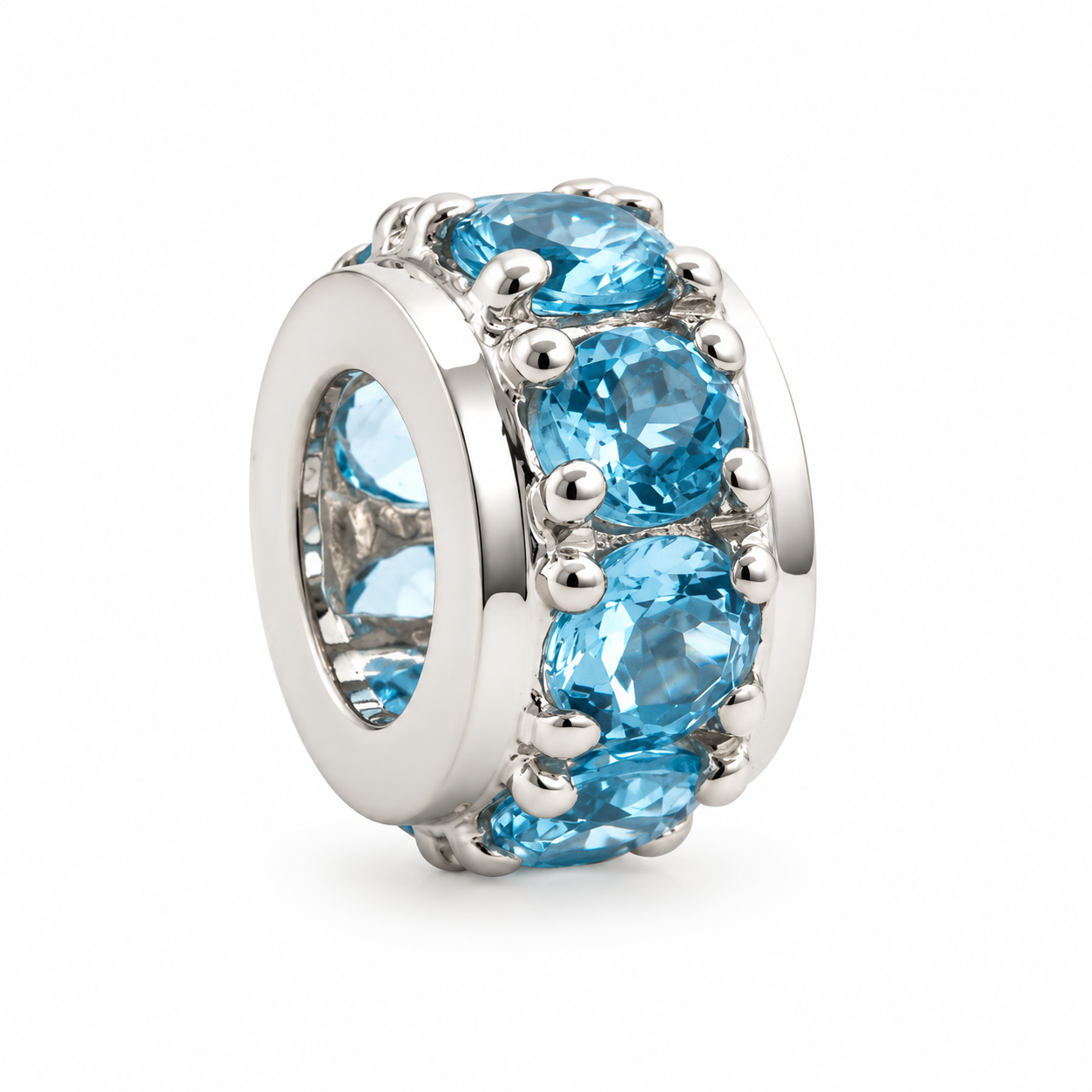 925 sterling silver natural blue topaz rondelle spacer charm featuring blue gemstones in a polished silver setting, Laraquel Jewelry.