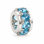 925 sterling silver natural blue topaz rondelle spacer charm featuring blue gemstones in a polished silver setting, Laraquel Jewelry.