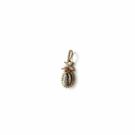 Close-up of a 14K solid tri-tone gold Miraculous Medal pendant with clear cubic zirconias and a delicate rose flower detail on a clean white background.