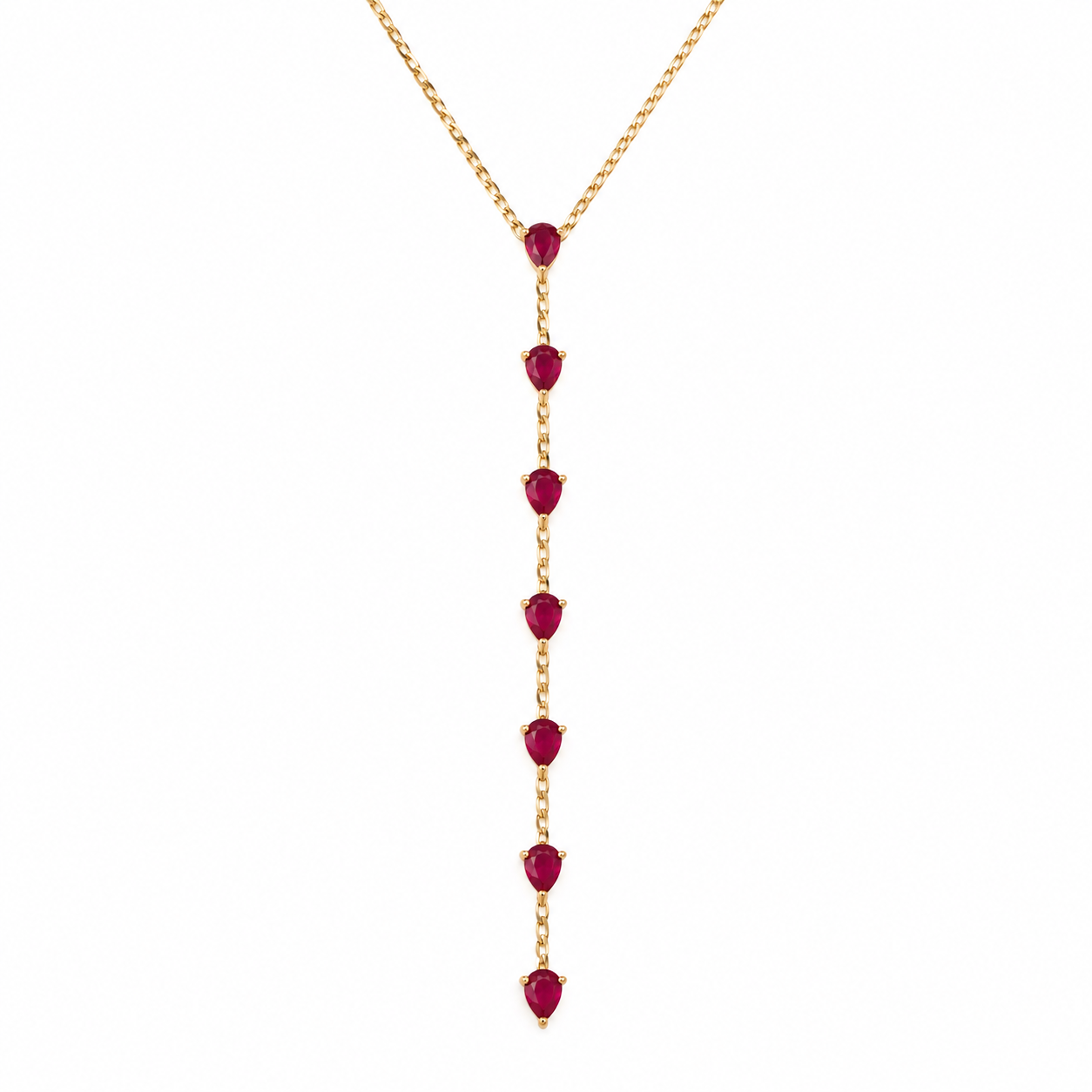 14K solid yellow gold lariat necklace featuring seven natural pear-shaped rubies on a delicate square Italian Cuban link chain.