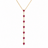 14K solid yellow gold lariat necklace featuring seven natural pear-shaped rubies on a delicate square Italian Cuban link chain.