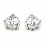 Side view of a pair of certified pear-cut lab-grown diamond earring charms in solid 14K white gold, showing the three-prong settings and polished metal bases.