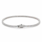 14K solid white gold tennis bracelet featuring 1.35 carats of natural diamonds, 1.8mm width, 7-inch length, and a secure diamond-accented clasp. Classic fine jewelry by Laraquel Jewelry.