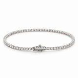 14K solid white gold tennis bracelet featuring 1.35 carats of natural diamonds, 1.8mm width, 7-inch length, and a secure diamond-accented clasp. Classic fine jewelry by Laraquel Jewelry.