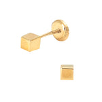 Gold cube-shaped earring on a white background