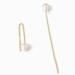 Pair of 14K solid yellow gold threader earrings featuring genuine 7.4 mm freshwater pearls with a delicate 2.75-inch pull-through chain design on a white background.