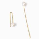 Pair of 14K solid yellow gold threader earrings featuring genuine 7.4 mm freshwater pearls with a delicate 2.75-inch pull-through chain design on a white background.