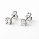 0.32 CT lab grown diamond stud earrings in solid 14K white gold with E color VS1 clarity and secure push back closures.