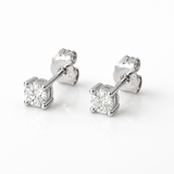 0.32 CT lab grown diamond stud earrings in solid 14K white gold with E color VS1 clarity and secure push back closures.
