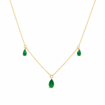 14K yellow gold necklace featuring three genuine pear-shaped emerald gemstones in delicate prong settings on a clean white background.