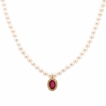 18K solid yellow gold pearl necklace with genuine oval ruby pendant surrounded by a diamond halo on a white background.