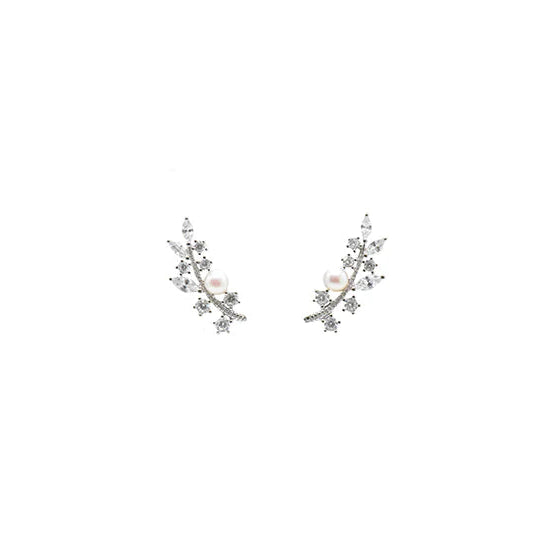 Pair of silver earrings with small pearls on a white background