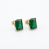 14K solid yellow gold emerald cut green CZ stud earrings with rectangular stones and butterfly backs.