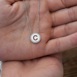 925 sterling silver cubic zirconia initial C necklace displayed on hand
