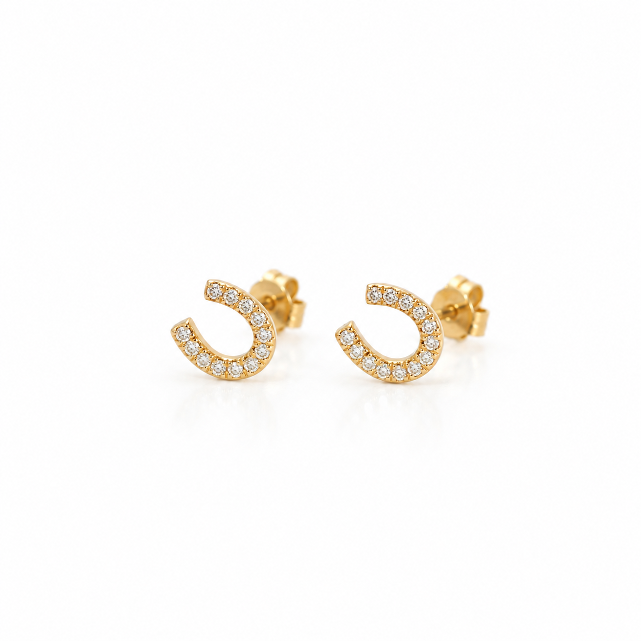 14K solid yellow gold horseshoe stud earrings with 0.07 CTW natural pavé diamonds on a white background.