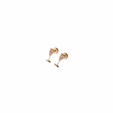 Gold champagne glass earrings on a white background