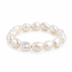 White baroque pearl stretch bracelet featuring 14 individually shaped pearls, approximately 10 × 12 mm each, arranged in an oval on a clean white background.