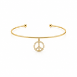 14K solid yellow gold open cuff bangle with dangling pavé diamond peace sign charm and polished ball ends on a white background.