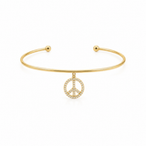 14K solid yellow gold open cuff bangle with dangling pavé diamond peace sign charm and polished ball ends on a white background.
