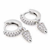 925 sterling silver huggie hoop earrings with cubic zirconia accents and dangling pavé cubic zirconia horn charms on a white background.