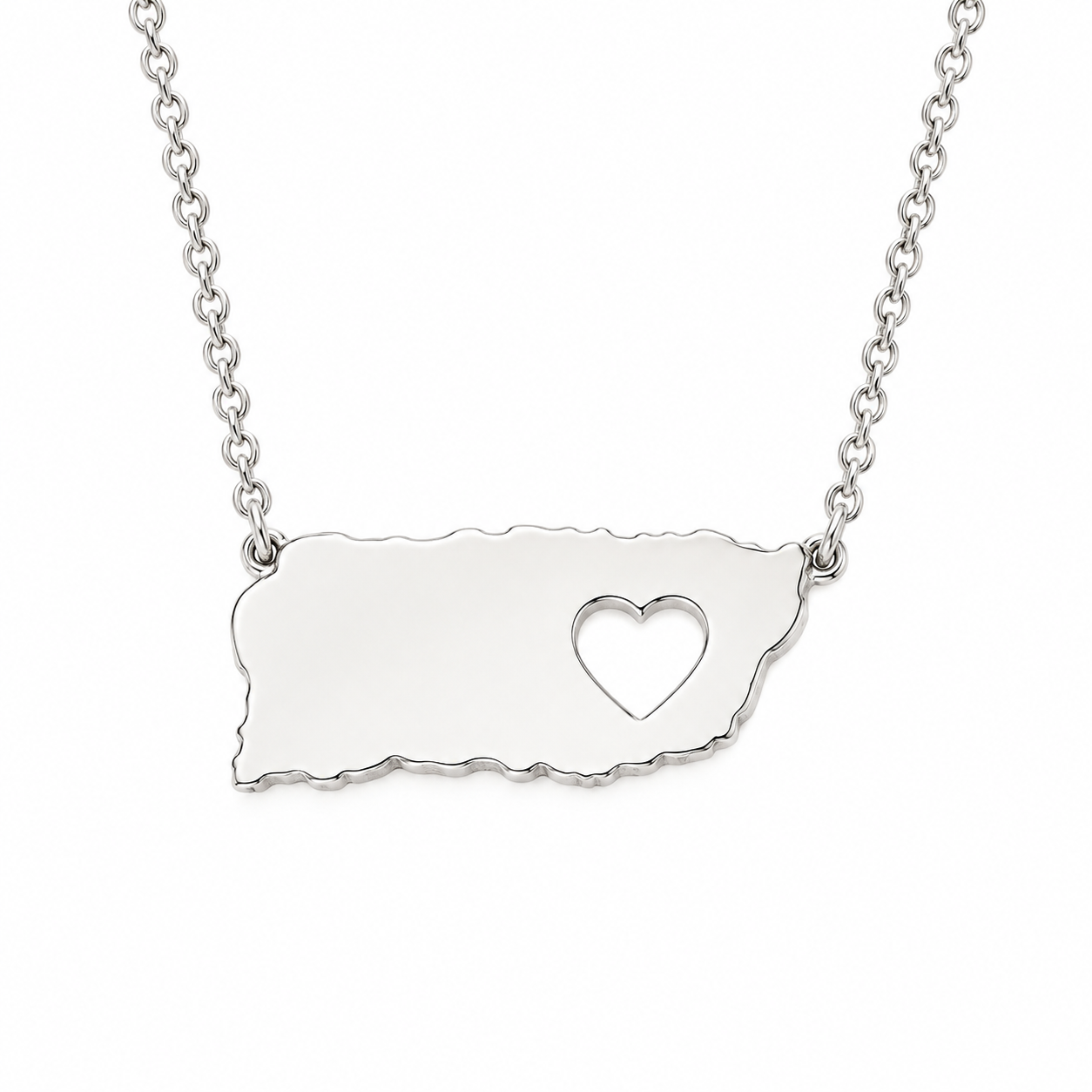 925 sterling silver Puerto Rico map necklace featuring a polished island-shaped plate with a heart cutout and delicate link chain on a pure white background.