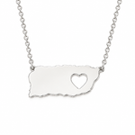 925 sterling silver Puerto Rico map necklace featuring a polished island-shaped plate with a heart cutout and delicate link chain on a pure white background.