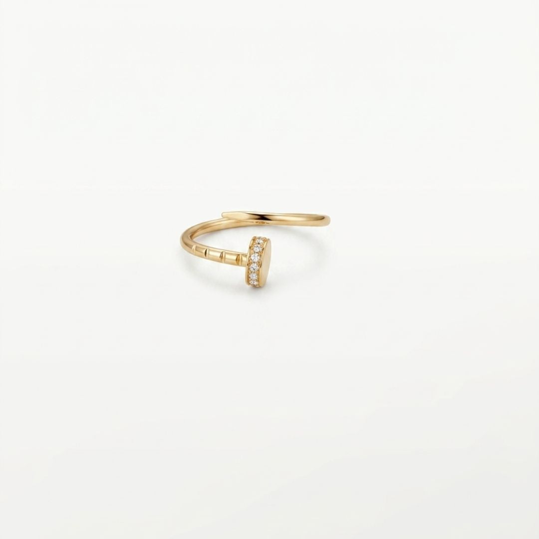 14K solid yellow gold adjustable nail ring with sparkling clear cubic zirconia stones on a white background.