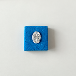 IGI certified 2.09 CT oval brilliant lab-grown diamond with E color and VS1 clarity on a white background.