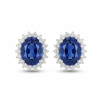 Front view of 14K white gold lab-grown blue sapphire halo stud earrings with sparkling diamond accents.