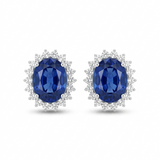 Front view of 14K white gold lab-grown blue sapphire halo stud earrings with sparkling diamond accents.