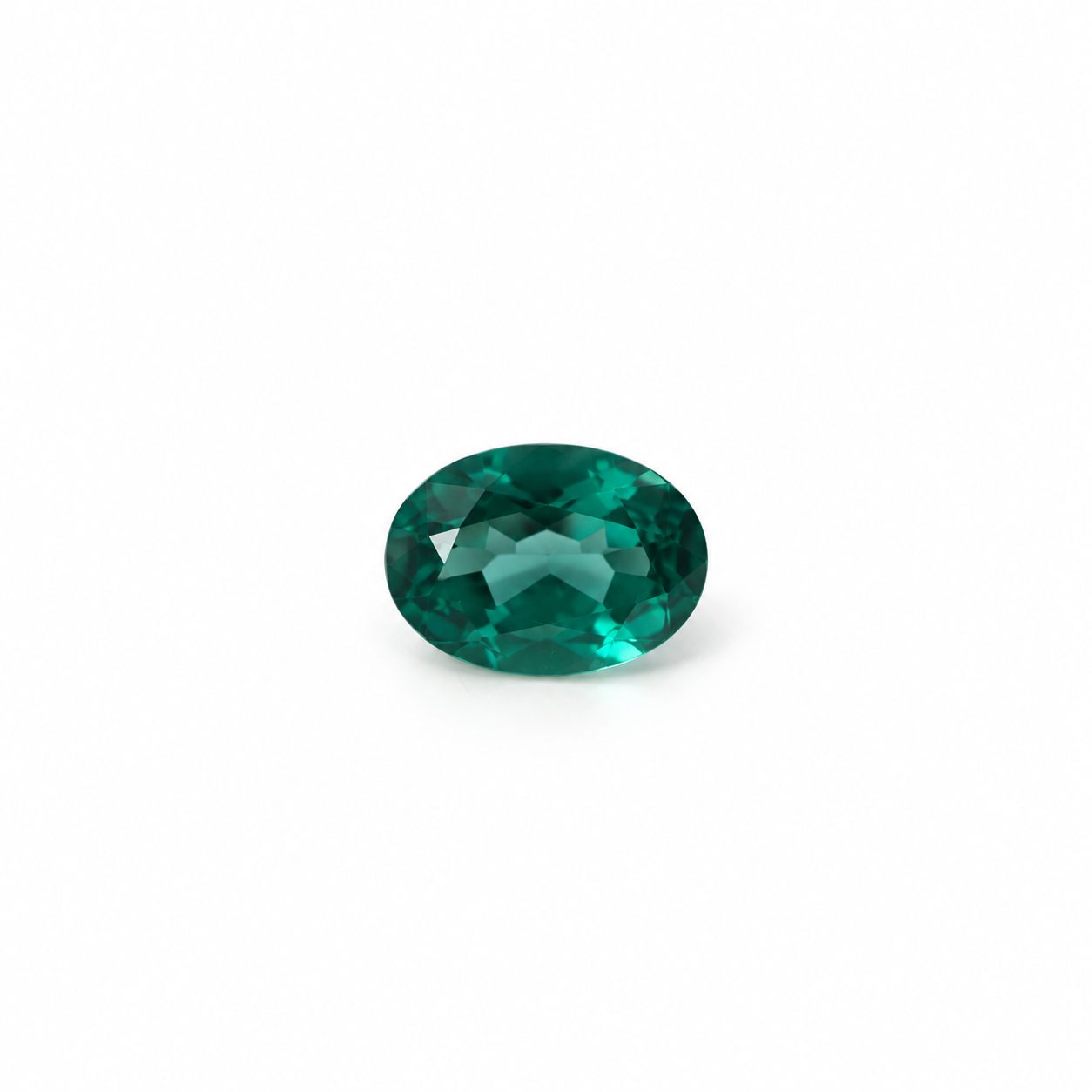 Oval 7 x 5mm green quartz loose gemstone on white background