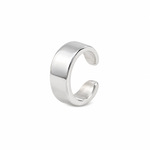 Single sterling silver ear cuff with a smooth polished finish on a white background