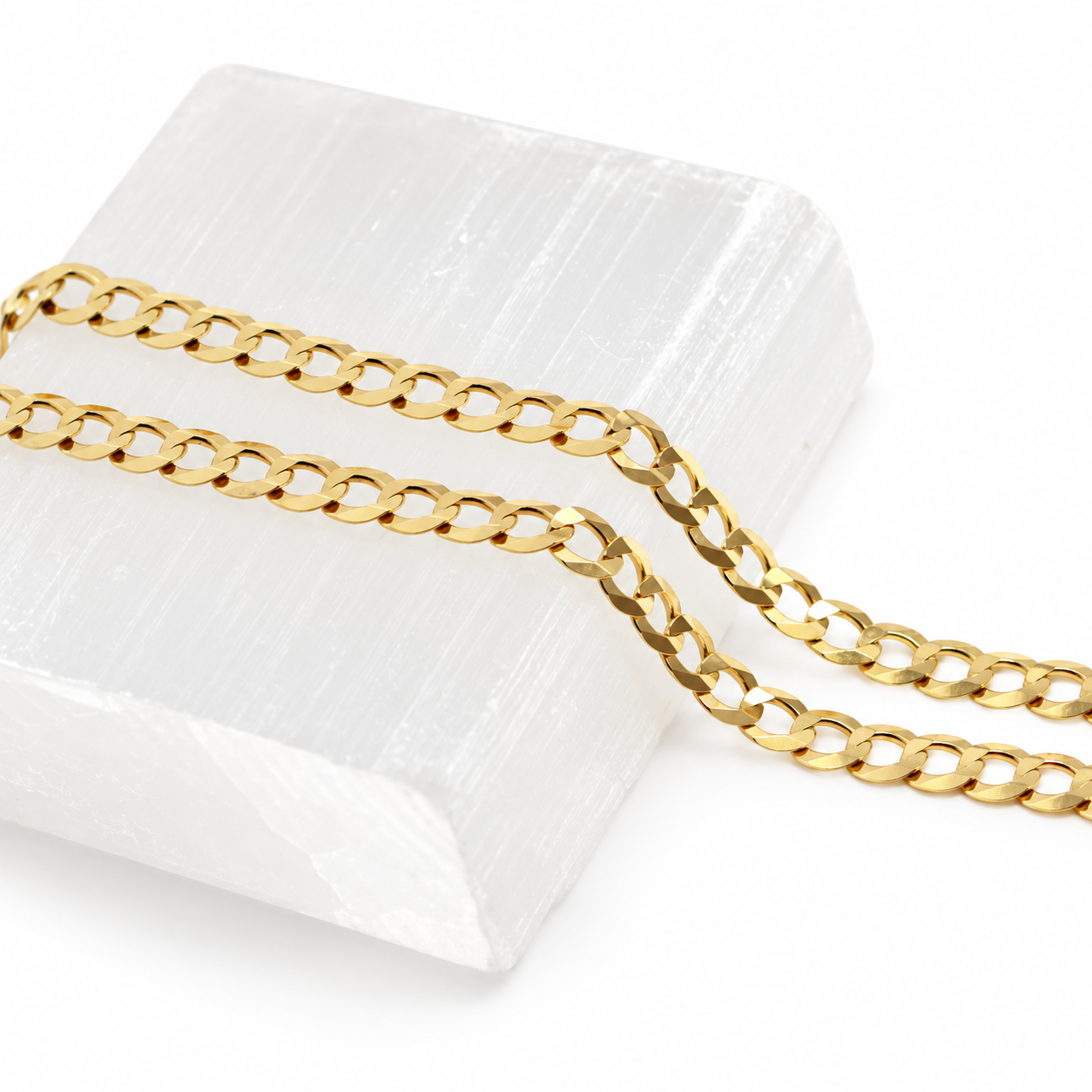 14K solid yellow gold 6mm Cuban link chain displayed on a white background