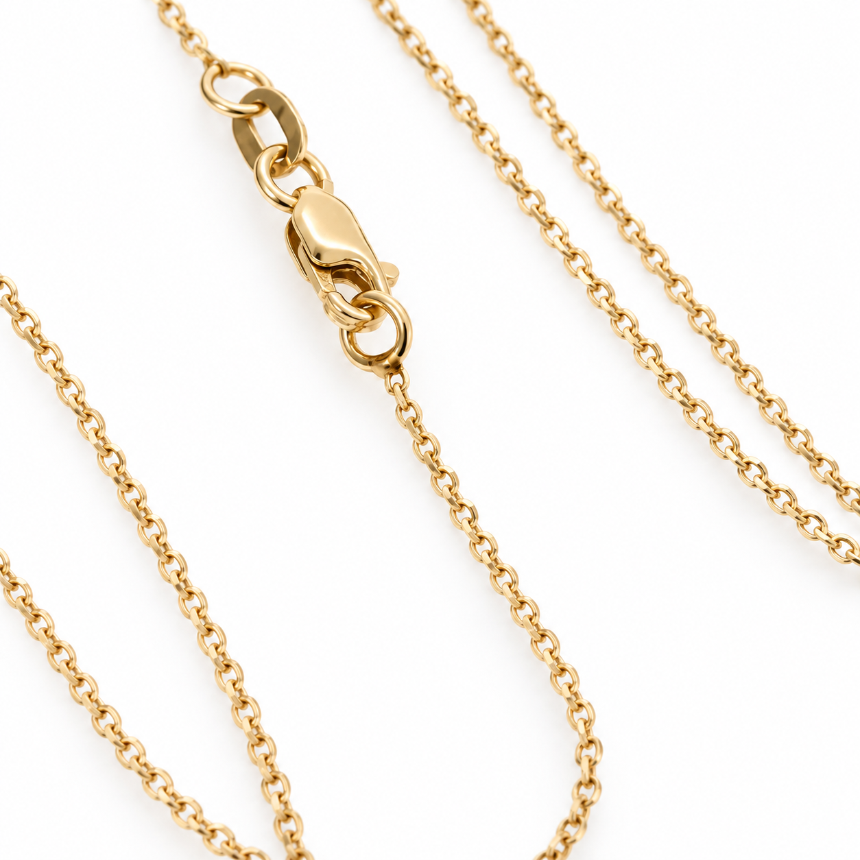 14K solid yellow gold 1mm rolo chain with lobster clasp on a white background