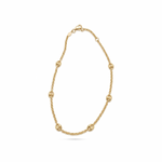 14K solid yellow gold rolo chain anklet featuring polished mariner links and a fancy lobster clasp on a white background.