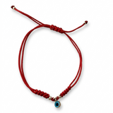 14K solid yellow gold adjustable red string bracelet with 4 mm evil eye charm on white background