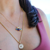 14K Solid Gold Mother of Pearl Evil Eye Pendant with Cubic Zirconia